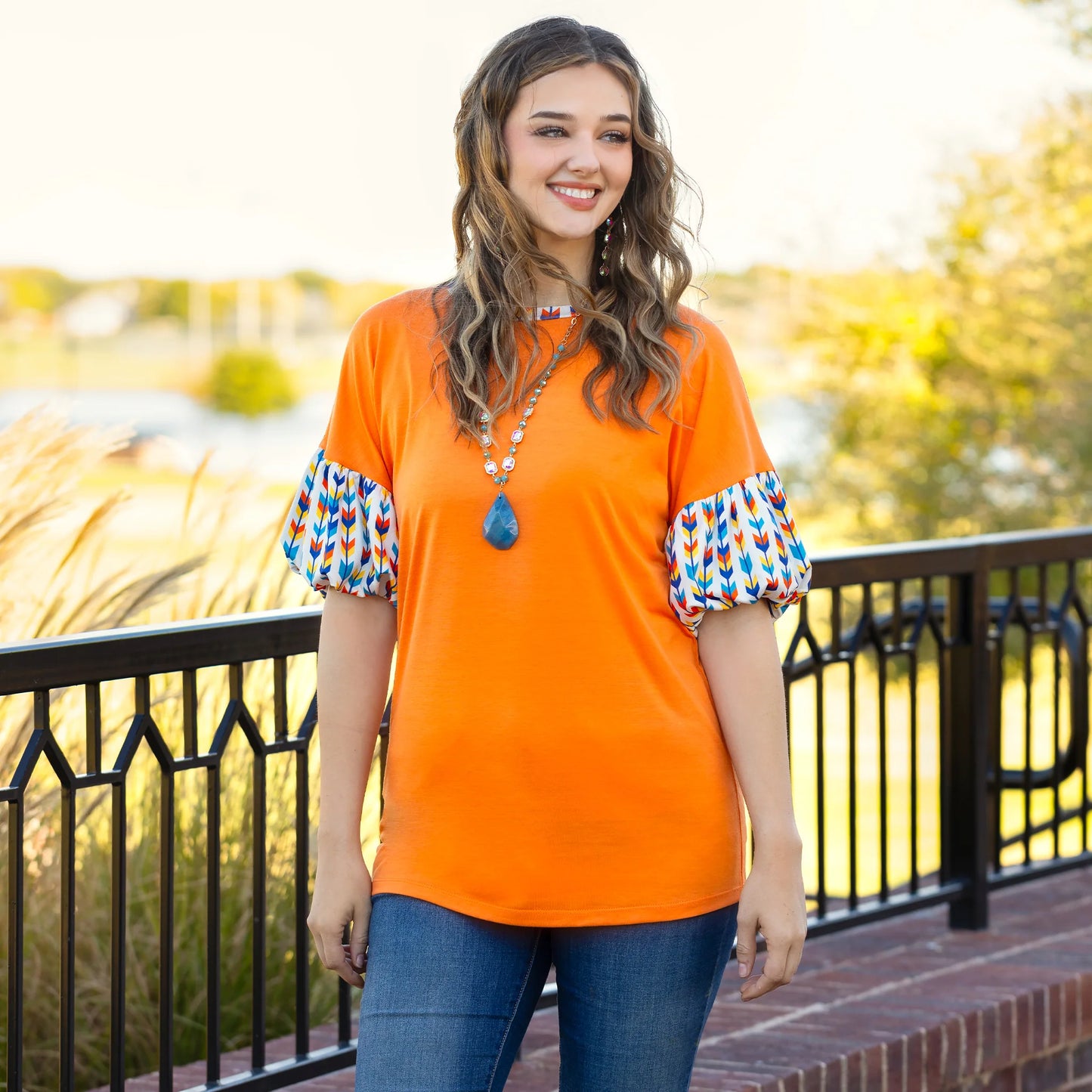 Orange Top with Geometric Balloon Sleeves