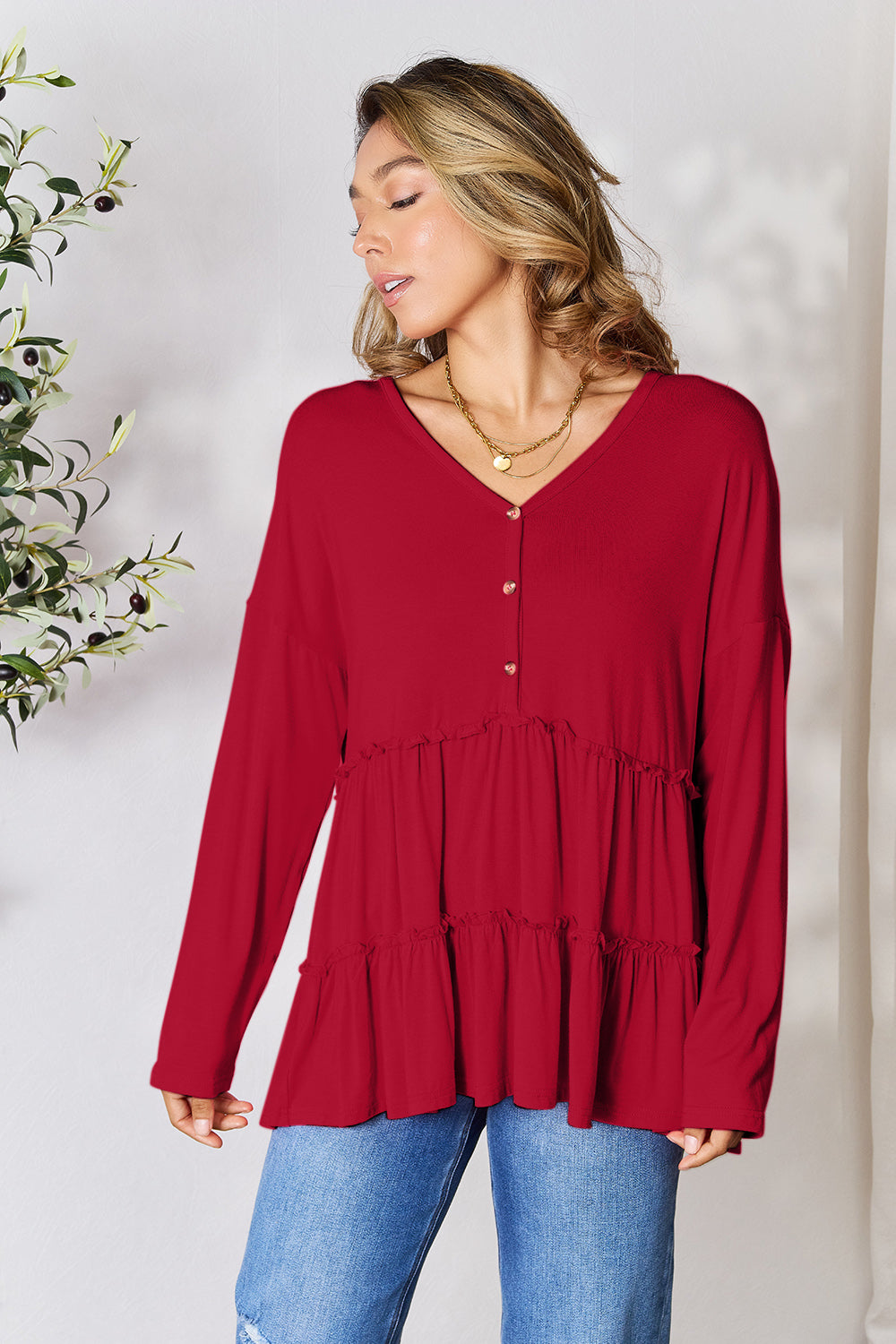 DoorBuster Double Take Half Button Long Sleeve Ruffle Hem Blouse