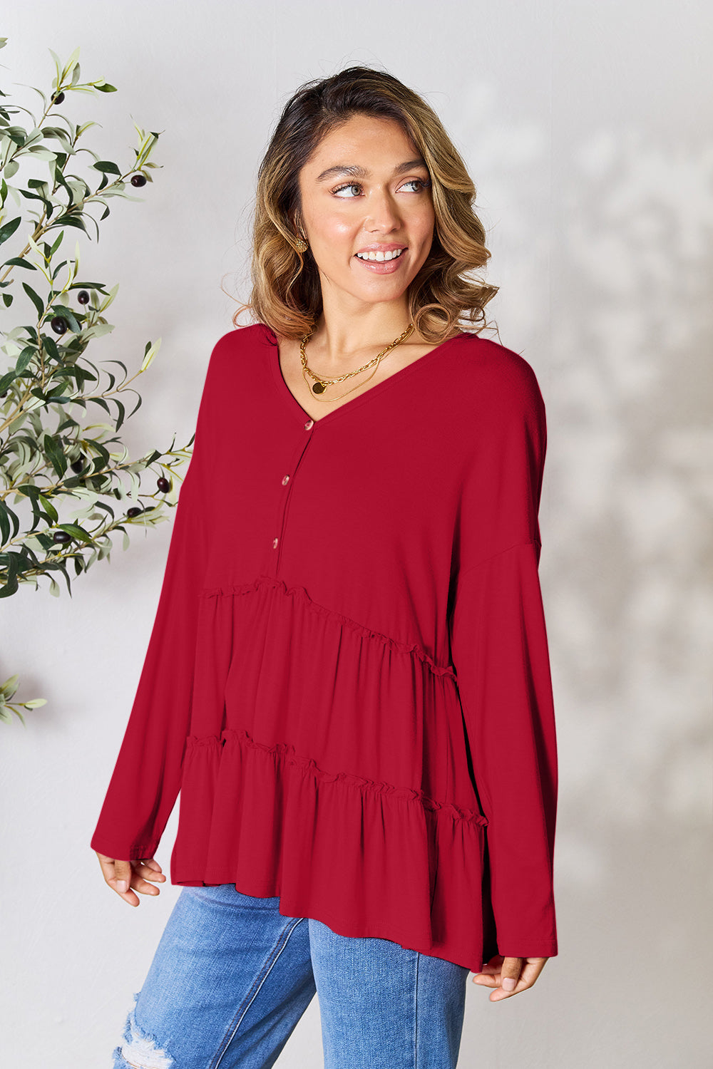 DoorBuster Double Take Half Button Long Sleeve Ruffle Hem Blouse