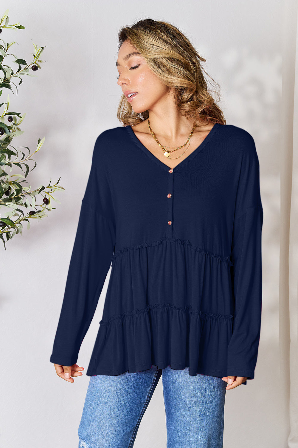 DoorBuster Double Take Half Button Long Sleeve Ruffle Hem Blouse
