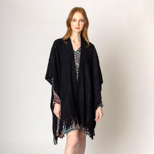 Solid Color Circle Pattern Knit Ruana Wrap Featuring Tassel Hem - Black