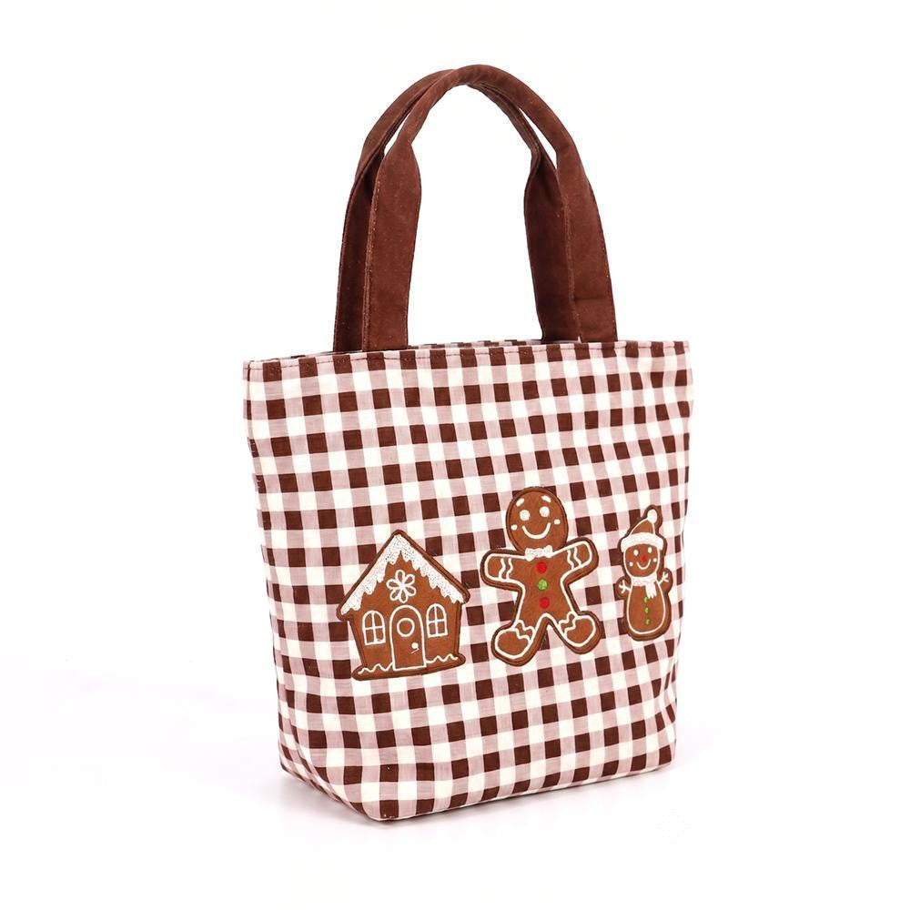 Gingham canvas tote with an embroidered gingerbread scene